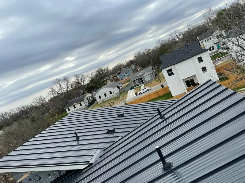 Standing seam metal roof panels with vents for Skylight Repair in Kings Mountain